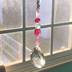 Very pretty Sun Catcher. Perfect for sunny windows or outdoor patio. Hand made
